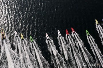 Powerboat Racing in Macau with boats racing accross the harbour